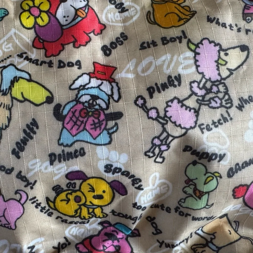 Puppy Love Purse with 2 top zippers and sm side zip.
Cream with bone zip pulls - Picture 10 of 10